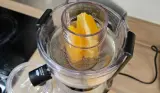 Oranges being put inside the magic bullet Mini Juicer