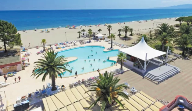 The beachfront pool at Eurocamp Marina d'Erba Rossa in Corsica