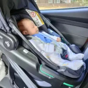 Newborn in Maxi-Cosi Coral 360 car seat
