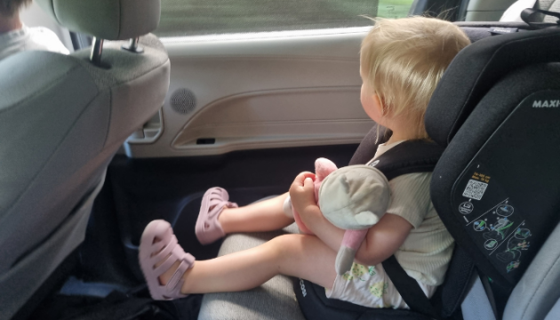 Toddler in Maxi-Cosi Nomad Plus car seat