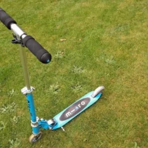 A birds-eye view of an aqua-coloured Micro Sprite scooter