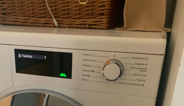 Miele WEG665 washing machine control panel with prompt