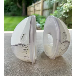 momcozy m6 breast pump in testing showing collected breast milk