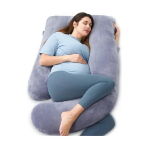 Momcozy pregnancy pillow stock image showing pregnant woman relaxing into the pillow