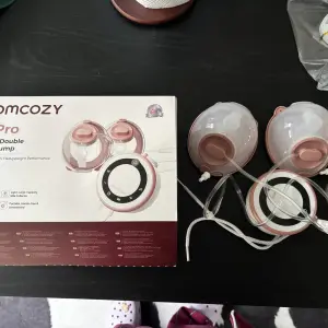 Momcozy V1 Pro Breast Pump in testing contents