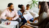 Mother and father with child at an assessment