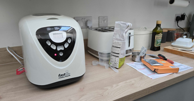 The Morphy Richards fastbake bread maker next to ingredients