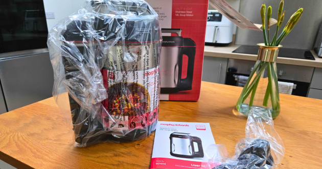 Morphy Richards Saute & Soup Maker wrapped in protective packaging with instruction manual and power cable