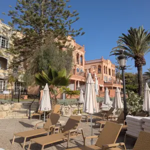 Bahia de Duque hotel and sun loungers