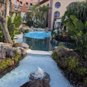 Bahia de Duque pool area and hotel from a bridge