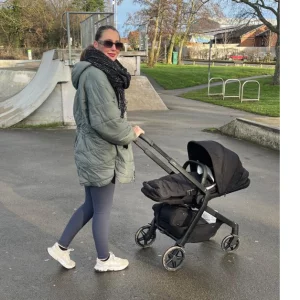 Mum pushing baby in Joolz Hub 2