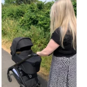 mum pushing bugaboo dragonfly stroller