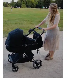 Mum pushing Ickle Bubba Atom