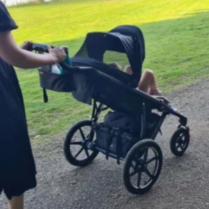 Mum pushing Thule Urban Glide 4 wheel