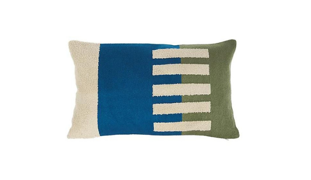 A blue, green and cream cushion from B&Q