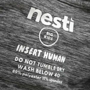 A close up of the care label inside a Nesti Compression Pod