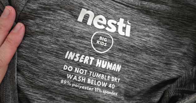 A close up of the care label inside a Nesti Compression Pod