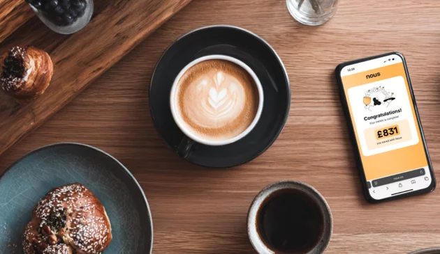 Nous app next to coffee and a pastry