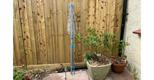 Mumsnet home editor Poppy O'Neill testing the Minky Freestanding Portable Rotary Airer