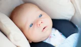 Newborn baby in car seat