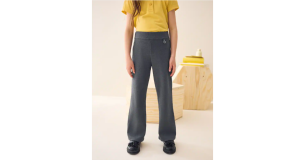Girl wearing grey NEXT school trousers
