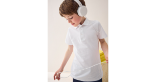 Boy wearing Next polo shirt
