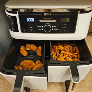 Ninja Foodi Max Dual Air Fryer AF400UK cooking chicken and chips