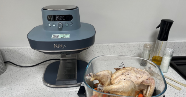 The Ninja Crispi Pro with a full chicken before cooking