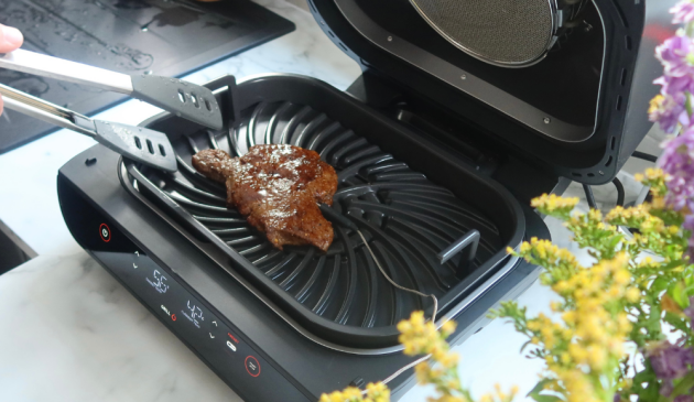 Ninja Foodi MAX Health Grill & Air Fryer cooking a steak