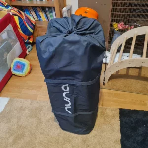 Nuna Sena Aire travel cot in travel bag