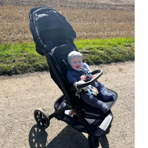 Child in Nuna TRVL lx stroller