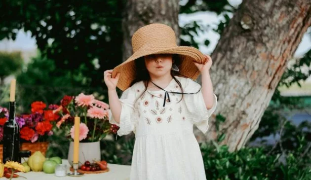 Girl in summer hat