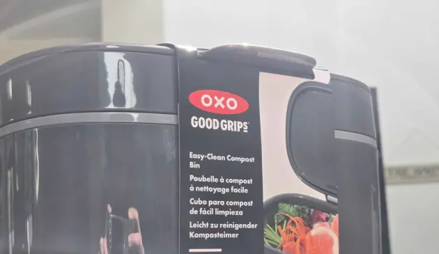 A close up of the packaging of the OXO Good Grips Easy-Clean Compost Bin