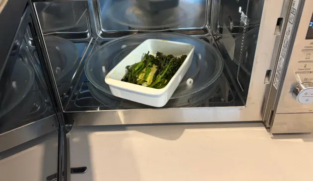 A view of tenderstem broccoli being cooked in the Panasonic 4-in-1 Air Fry Combi Microwave Oven