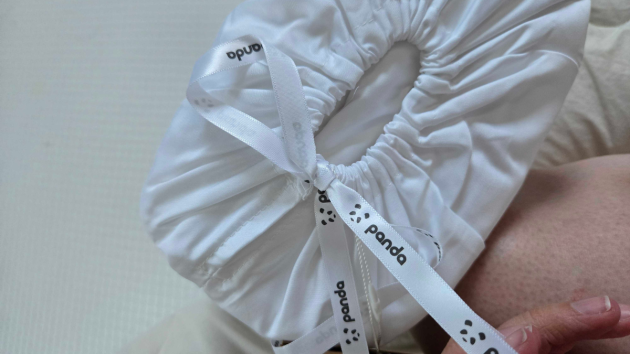 Close up of the Panda ribboned storage bag