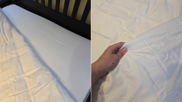 A hand shows up close the Panda 100% bamboo bedding set