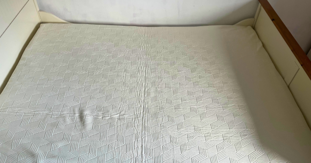 Overhead view of the Panda Hybrid Bamboo Mattress Pro showing its white geometric-patterned bamboo top cover