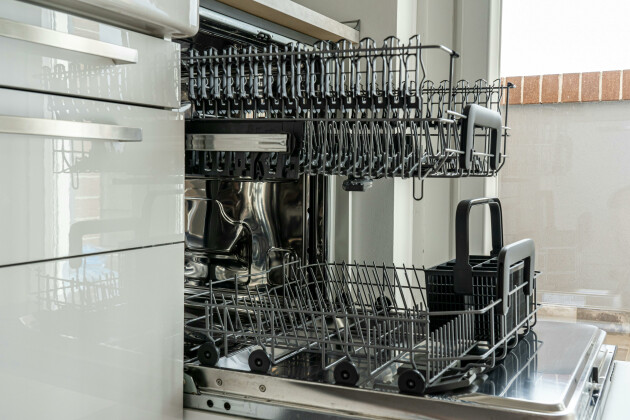 Dishwasher in a kitchen with both racks out ready to be loaded