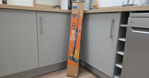 The Philips OneUp 5000 Series Electric Mop in its box in a kitchen