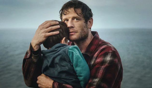 James Norton as Pete Riley holding his onscreen son, Theo, in ITV's Playing Nice