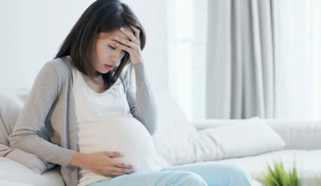 Worried pregnant woman