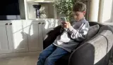 9 Year old Harrison tries the Other Phone