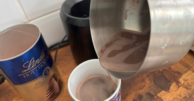 Pouring Lindt hot chocolate from the ProCook hot chocolate maker
