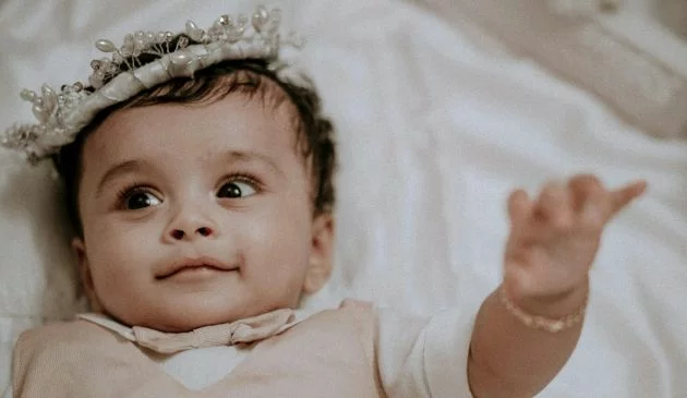 Baby wearing crown