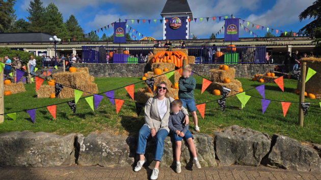 Mumsnet editor Rebecca with her two children at Alton Towers Scarefest