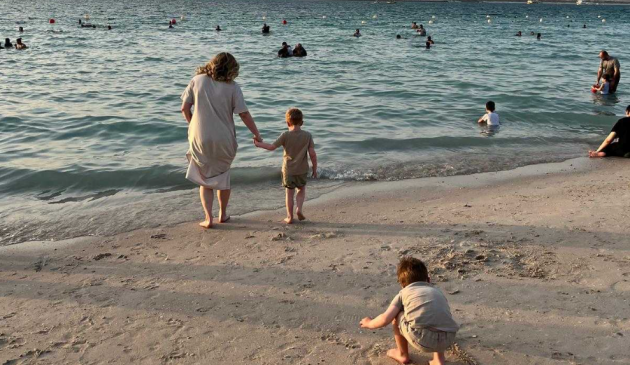 Rebecca Roberts and her children visit Corniche Beach in Abu Dhabi