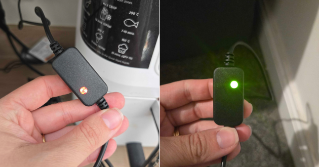 SealSkinz Stratton heated glove charger showing red and green charging lights