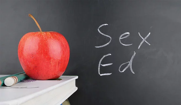 Sex education written on blackboard