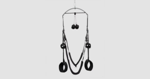 A product image of the DOMINIX Deluxe Fantasy Bondage Swing