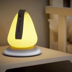shnuggle moonlight children's night light stock image